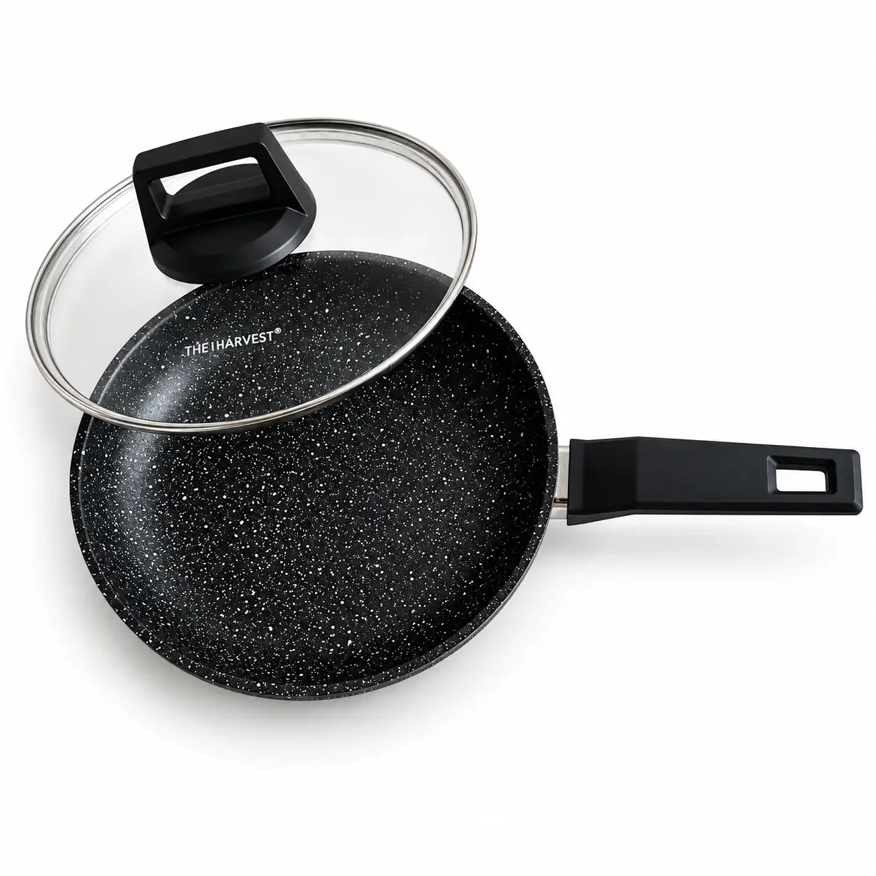 The Harvest non-stick frying pan with the glass lid lifted to show its black speckled cooking surface.
